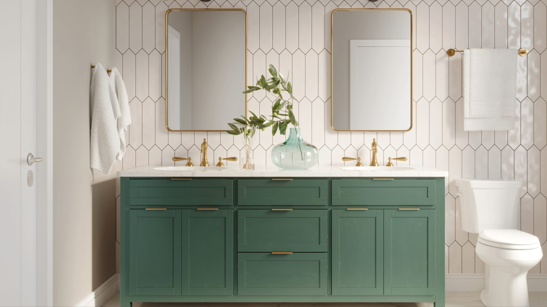 Green bathroom vanity with two sinks and two mirrors with gold trim 