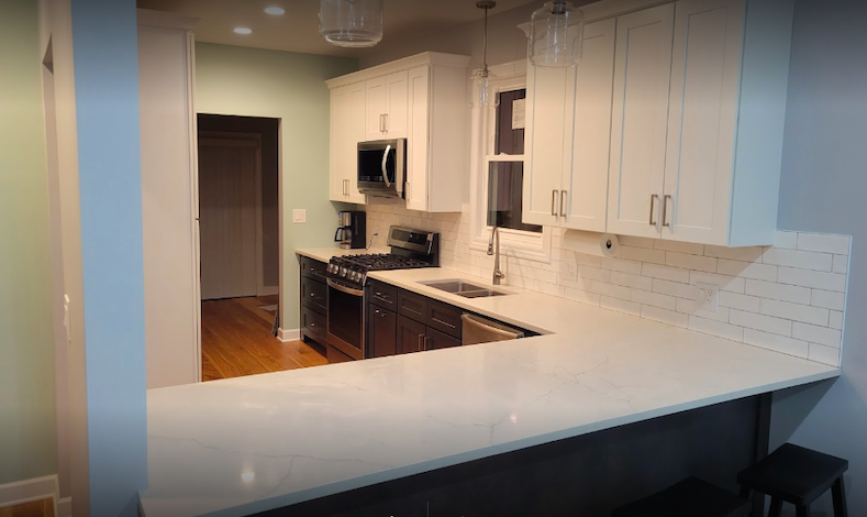 A photo of a custom remodeled kitchen with white countertops done by 4Ever Remodeling in the Chicago area