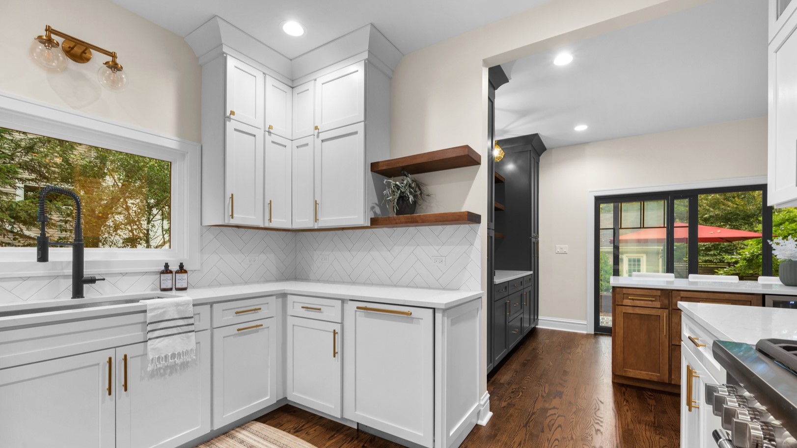 Open concept bathroom with white cabinets and view of outdoor living space in Arlington Heights, IL