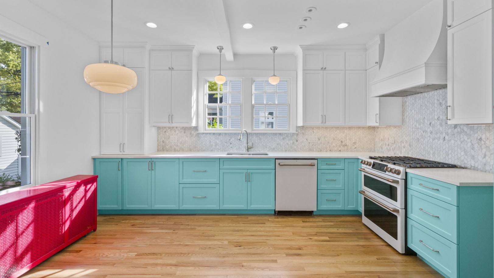 Kitchen remodel with pink and teal blue cabinets in Glenview, IL home