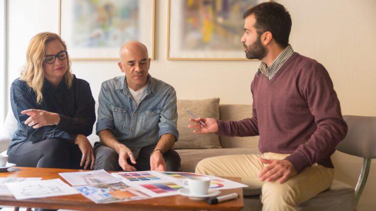 Mature owners choosing color for renovation