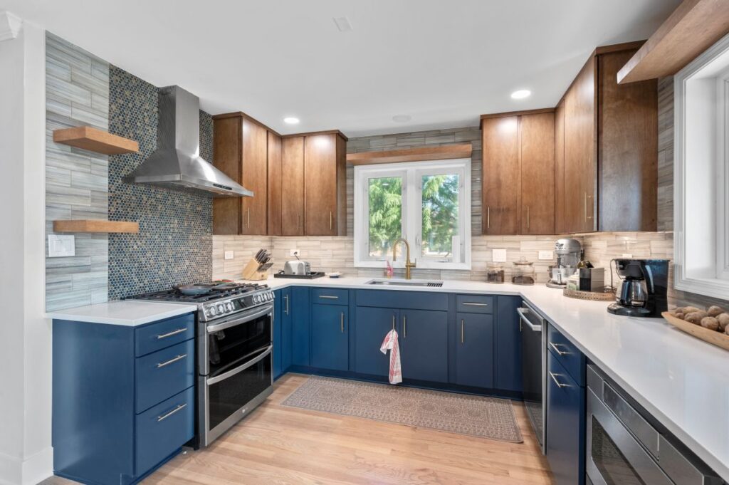 A newly remodeled kitchen with blue cabinets