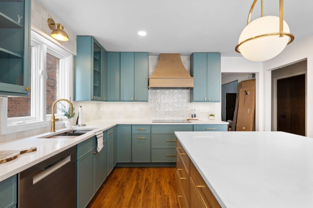 A newly remodeled kitchen with light blue cabinets