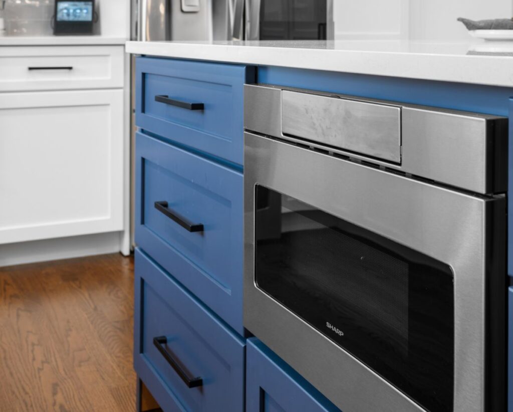 close-up of a blue cabinet and oven