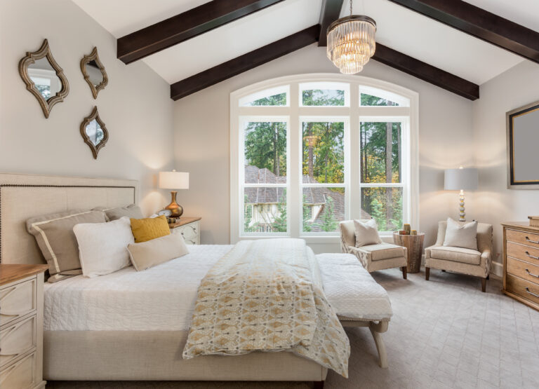 Beautiful furnished master bedroom interior in luxury home
