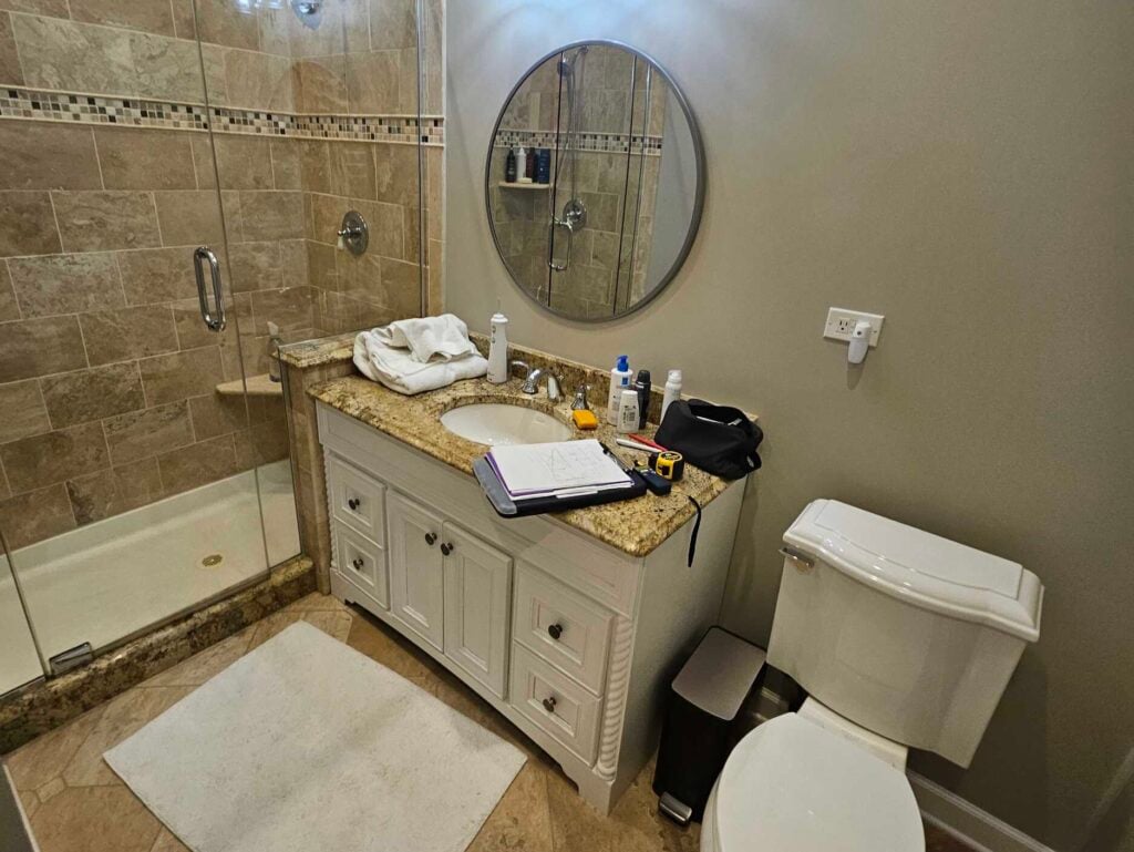 single bathroom vanity with sink marmoleum countertop round mirror