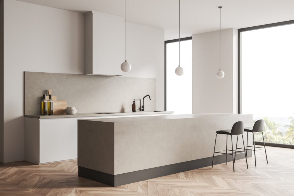 Beige cooking interior with bar chairs and countertop on hardwood floor, side view, panoramic window on countryside. Kitchenware and appliances. 3D rendering